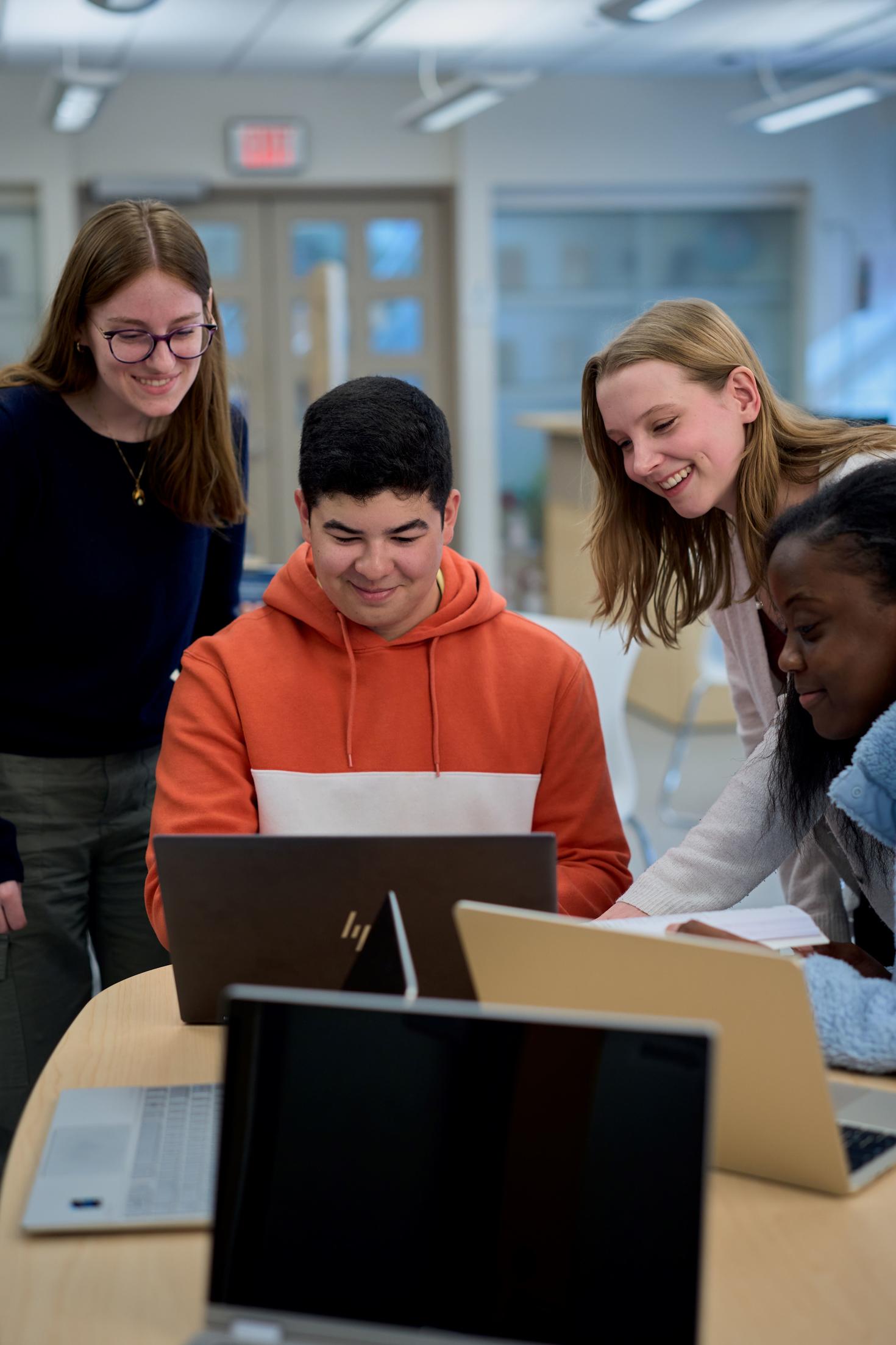 Students working in front of their laptops at the resource centre.