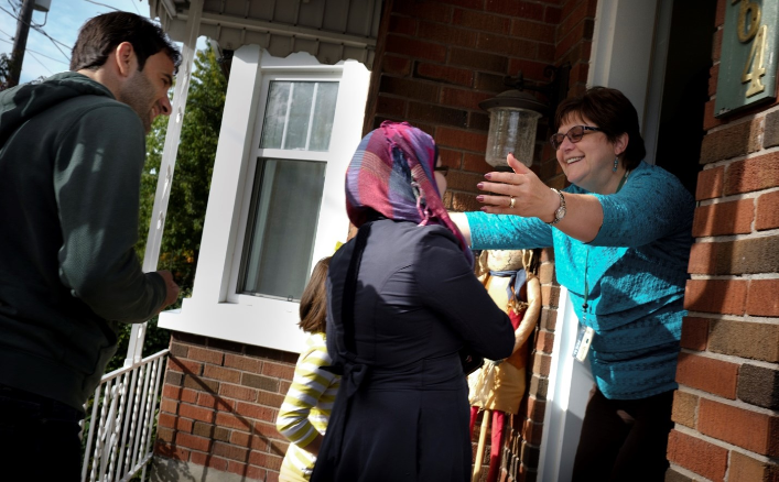 family of refugees being welcomed in Canada