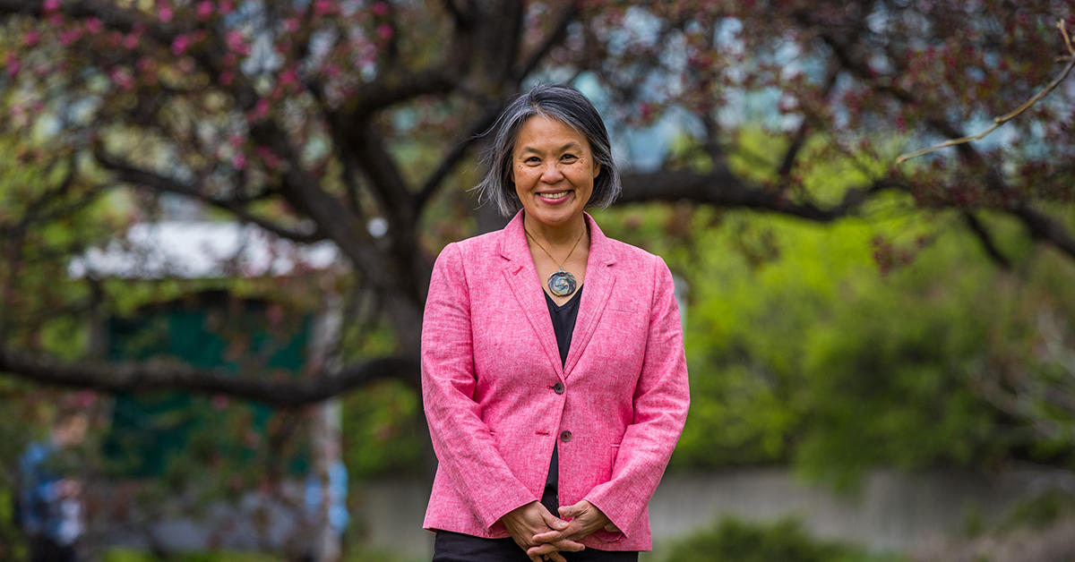 Portrait of University Librarian Talia Chung in a garden