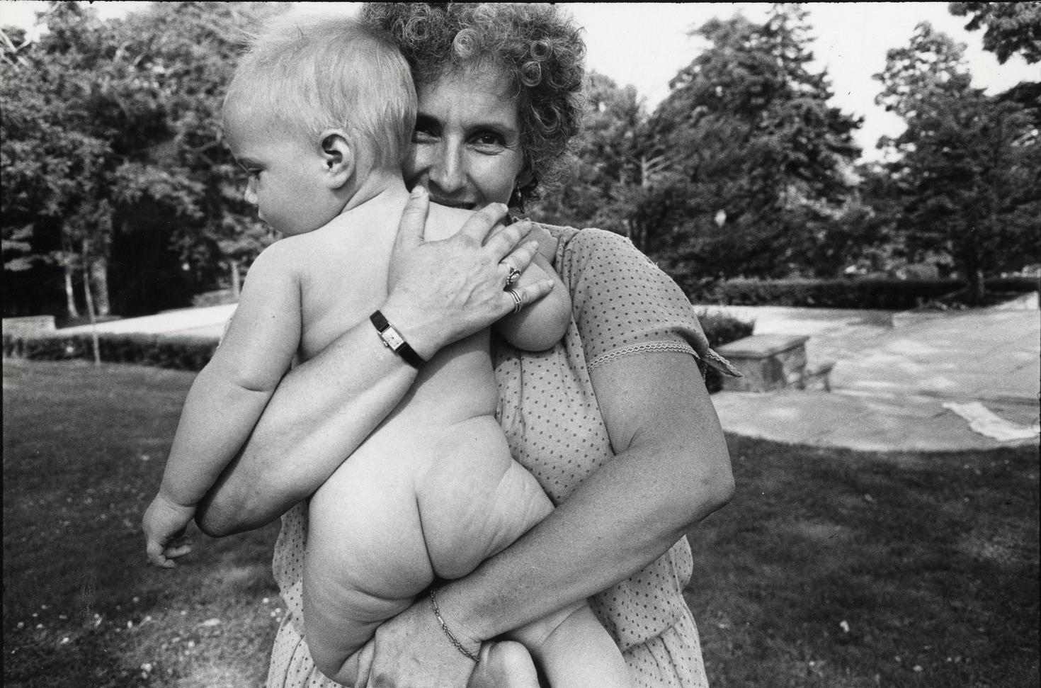 A Woman holding a baby