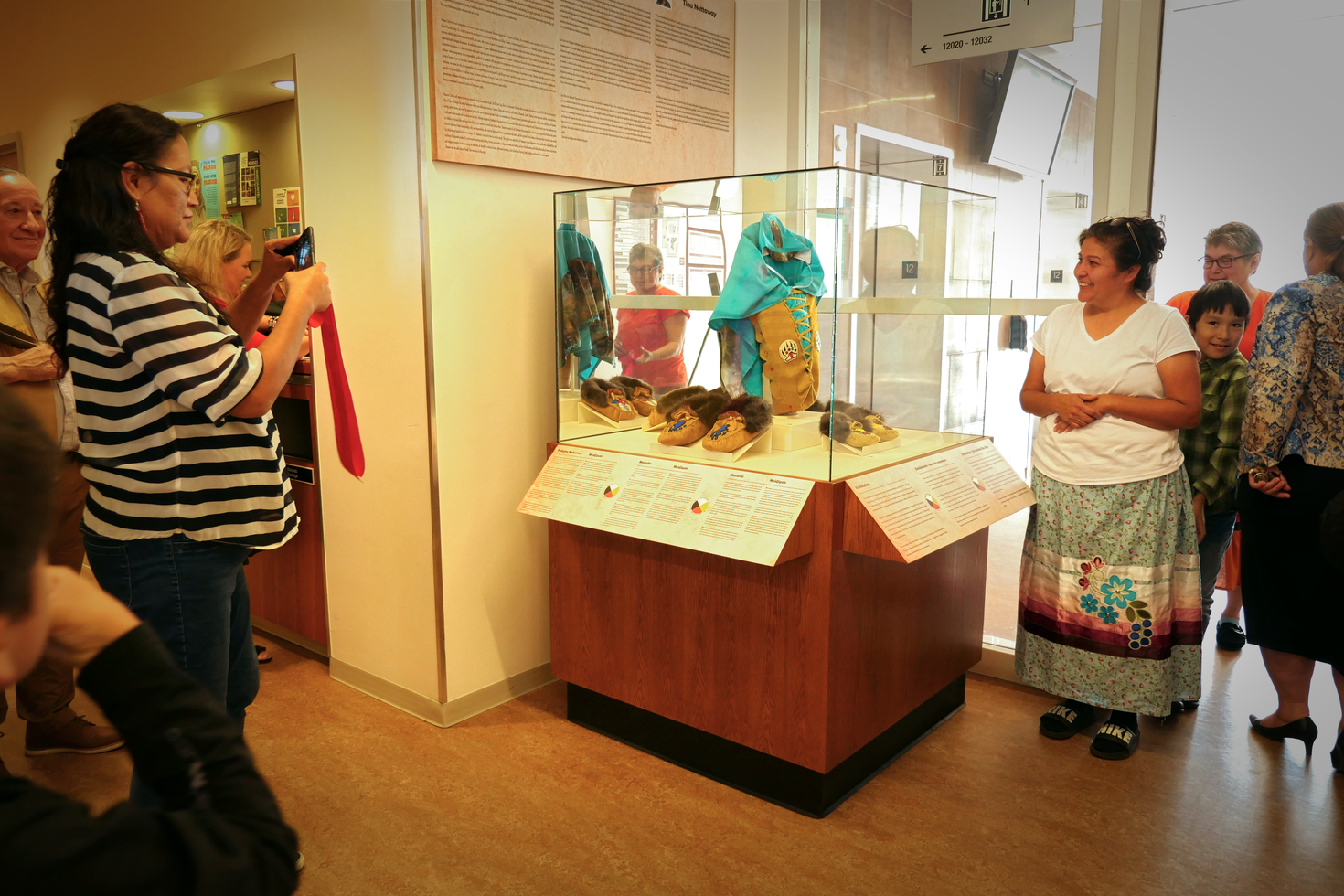 art display surrounded by people
