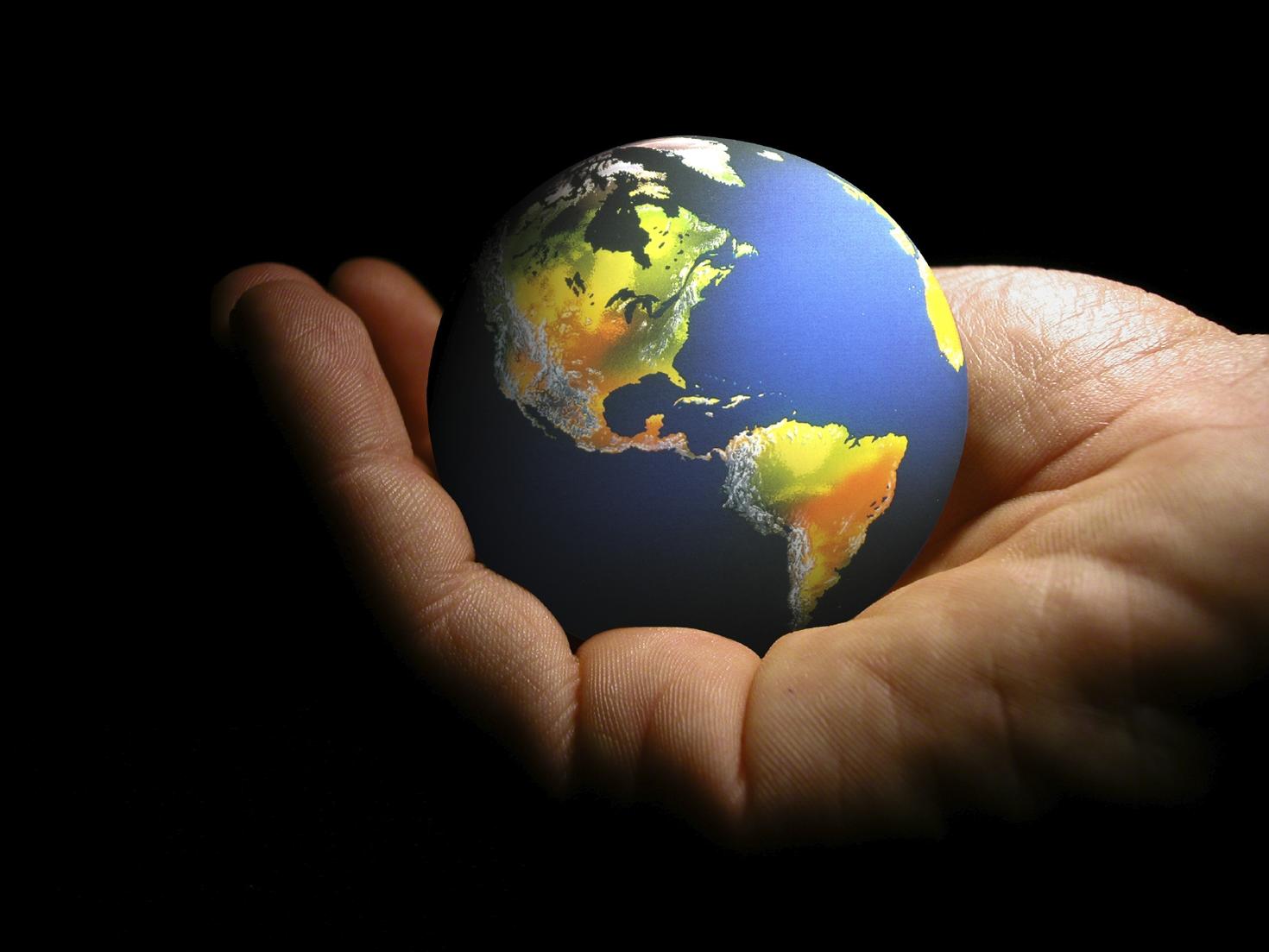 Planet earth in a hand