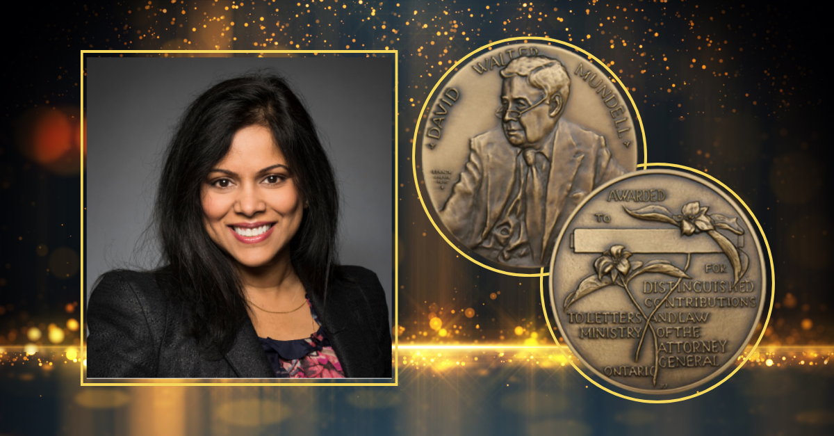 Professor Carissima Mathen with photos of the Mundell Medal