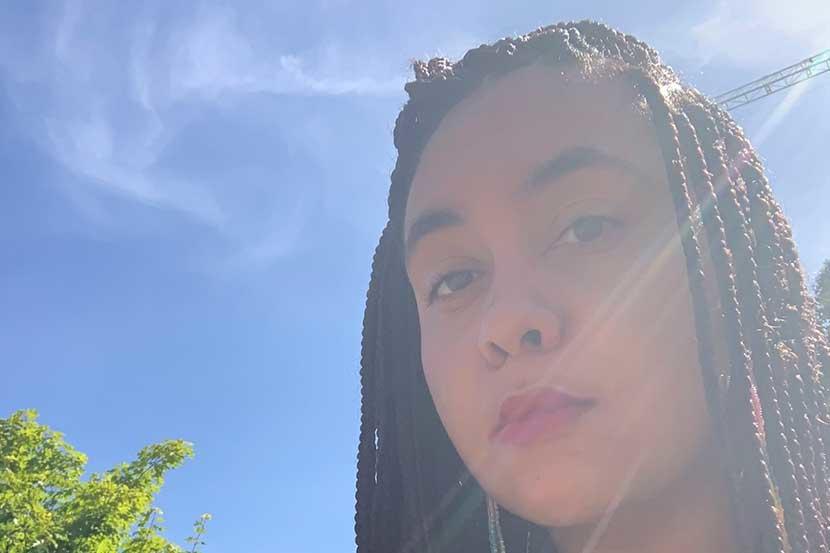 Victoria sitting in a park