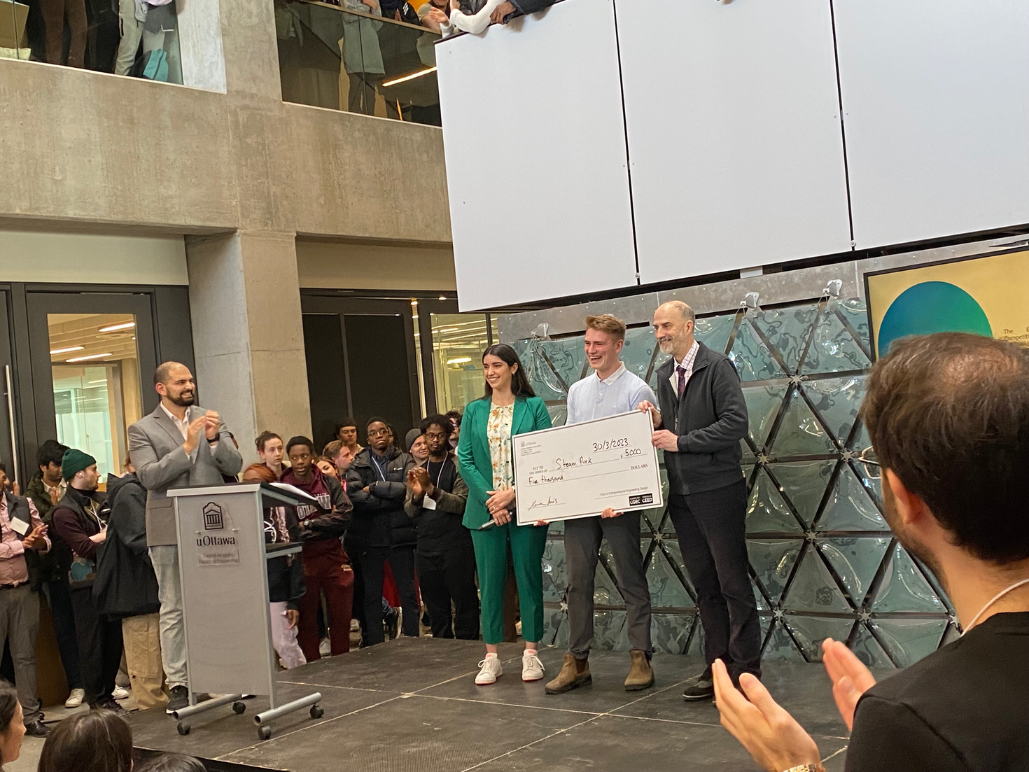 First place winner receiving cheque