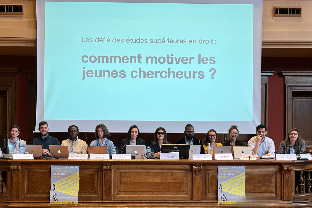 Les doctorants et doctorantes pendant une présentation