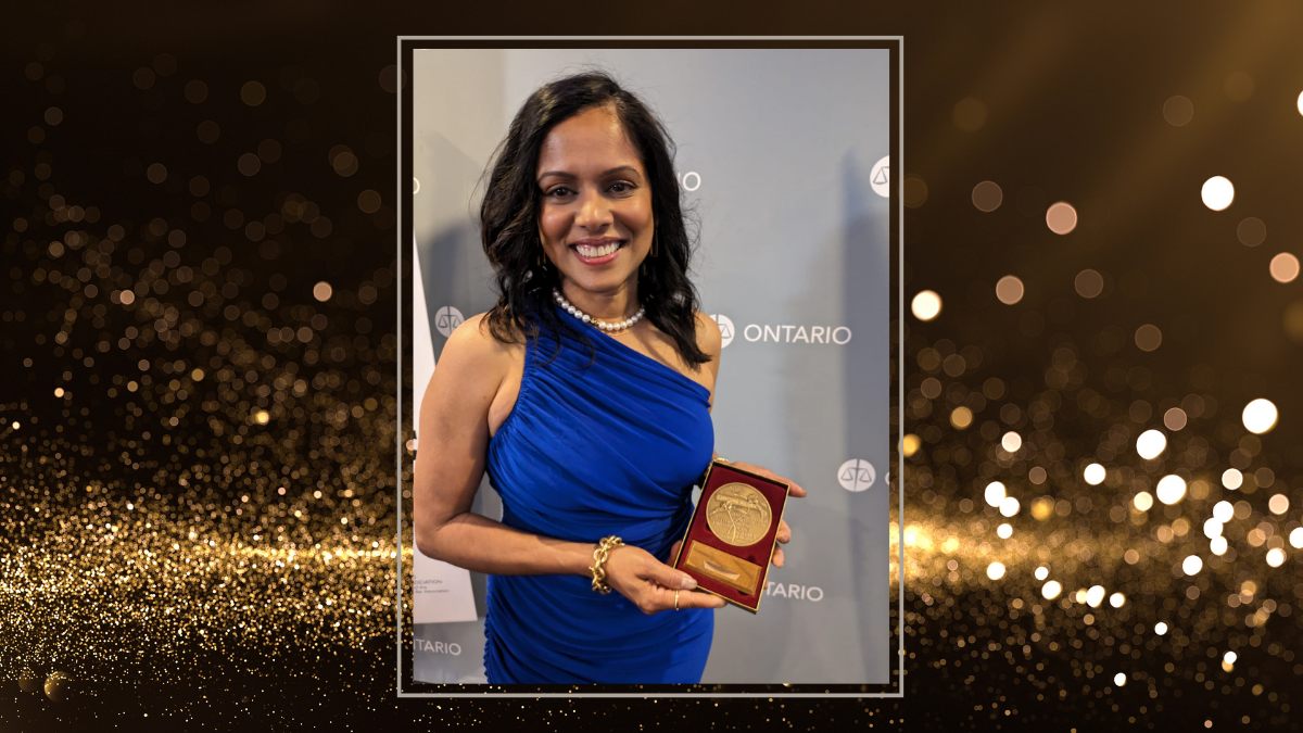 Professor Carissima Mathen holds her David Walter Mundell Medal
