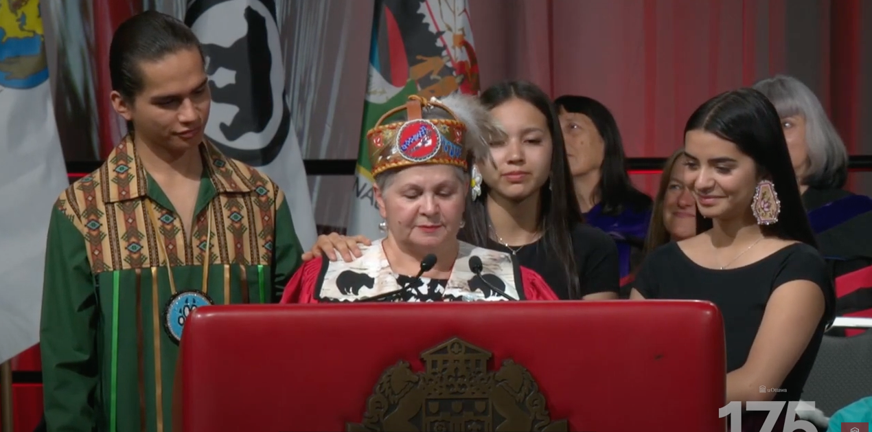 Claudette Commanda delivering her speech at convocation.