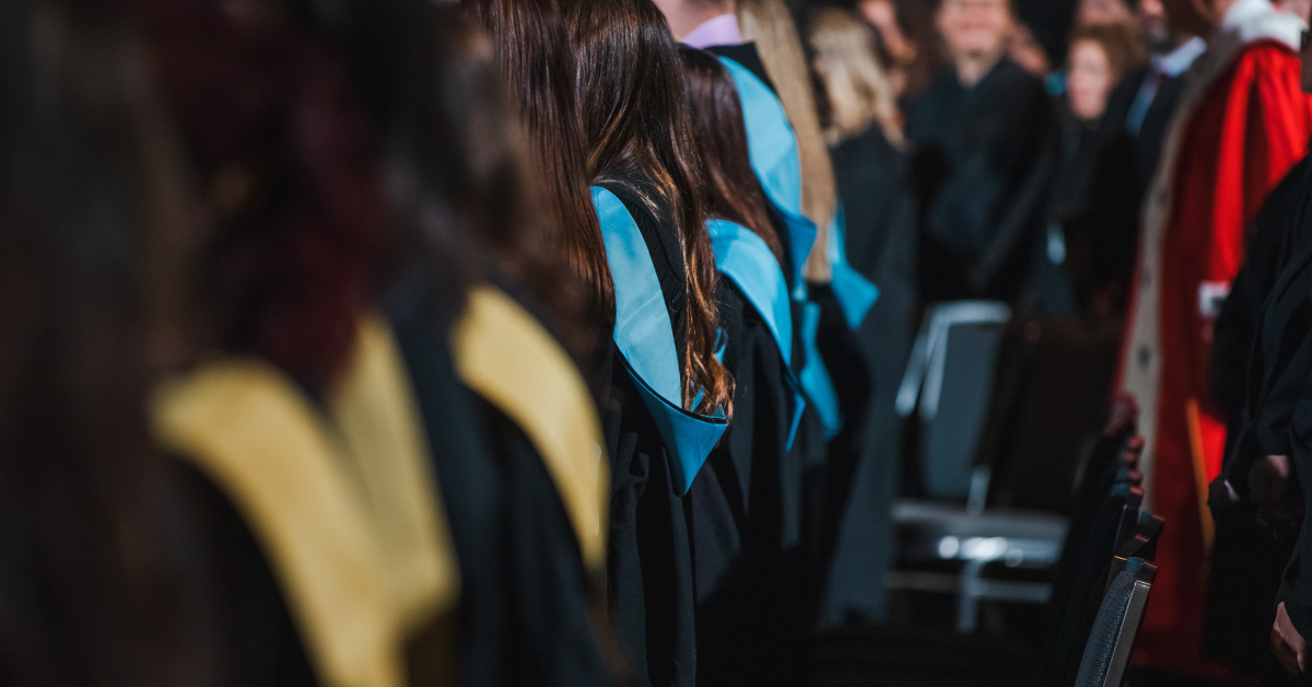Students seeing from behind at a convocation
