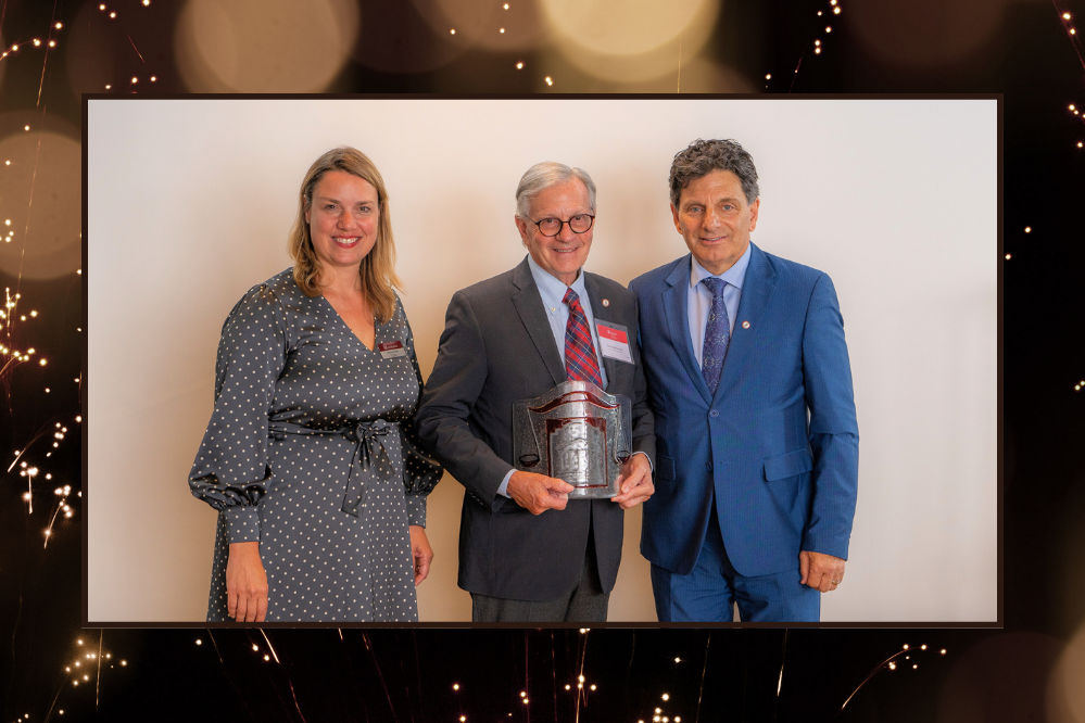 The Honourable Colin McKinnon poses with Dean Kristen Boon and nominator Lawrence Greenspon