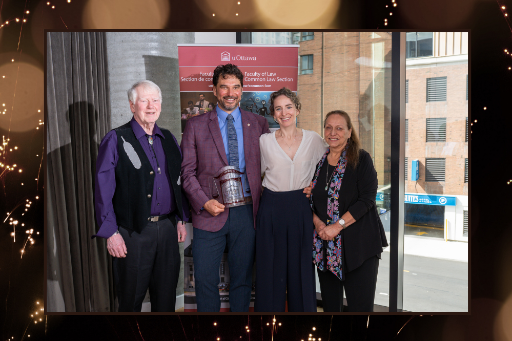 Jesse McCormick poses with his parents and wife