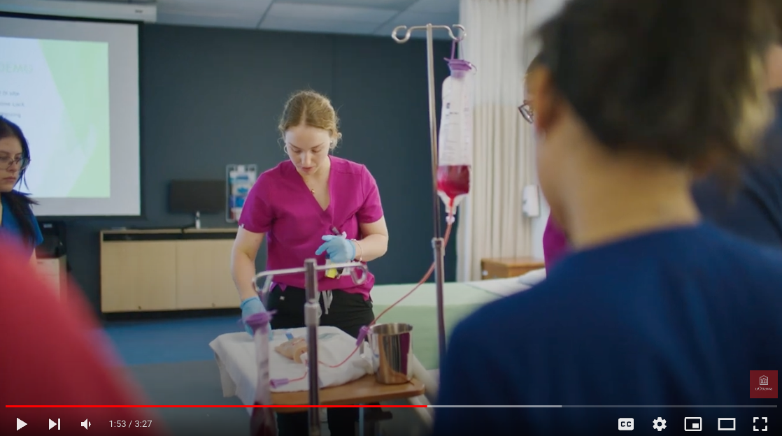 Nursing students in classroom at new Faculty of Health Sciences building.