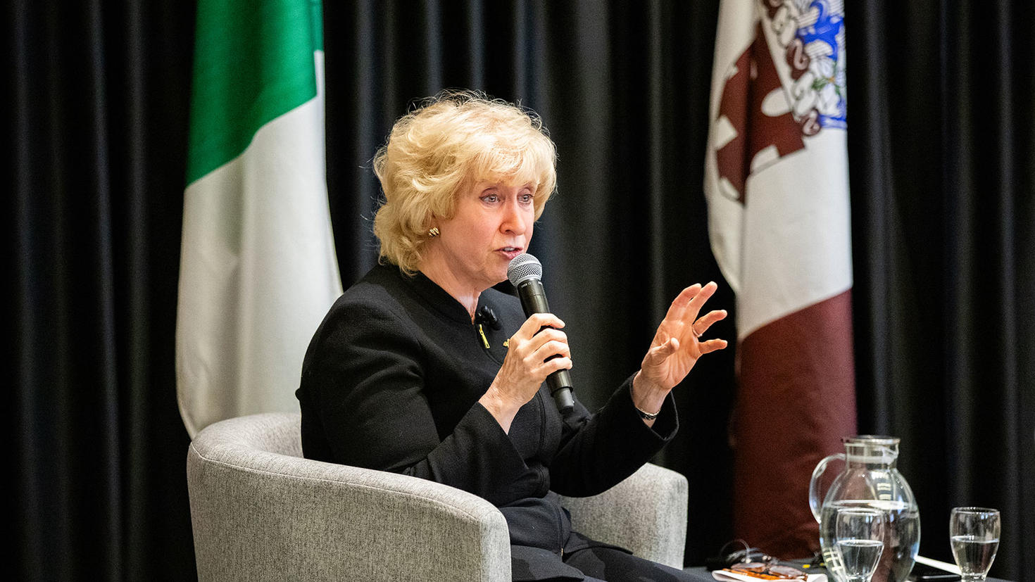 Rt. Hon. Kim Campbell speaking on stage at a uOttawa-hosted event.