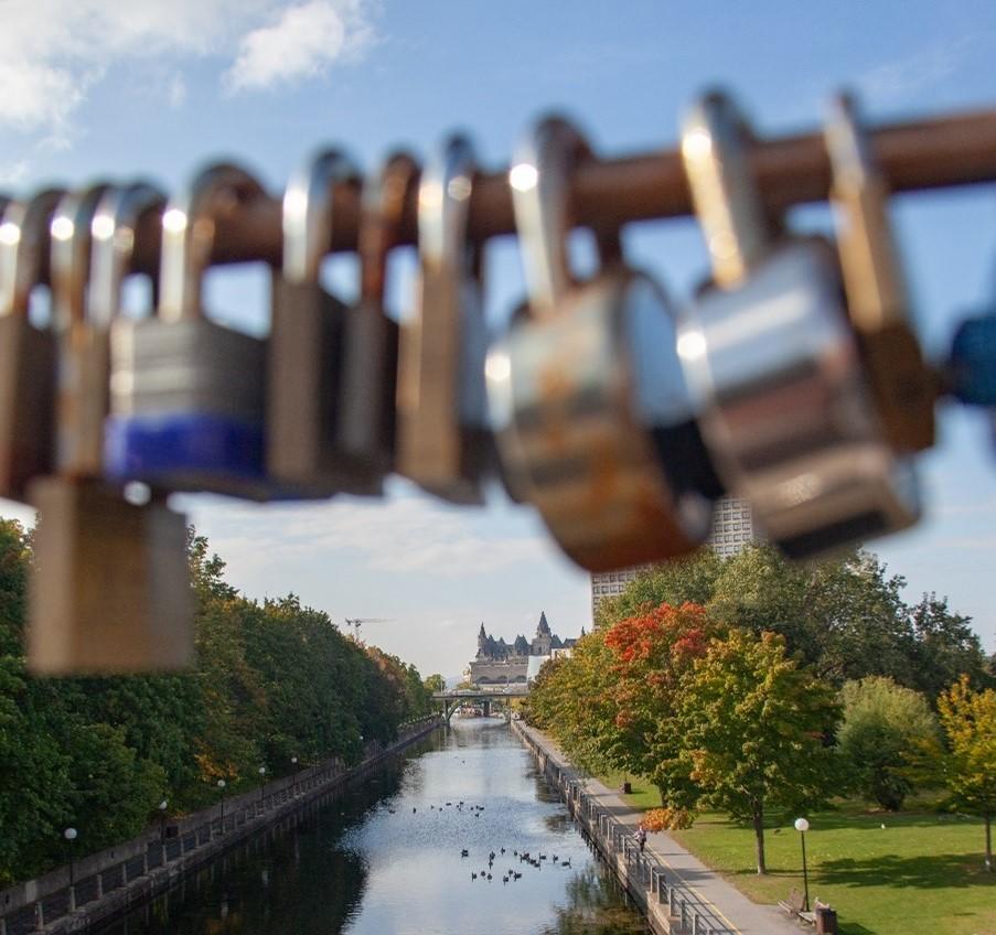 close up of padlocks on the corktown footbridge railing