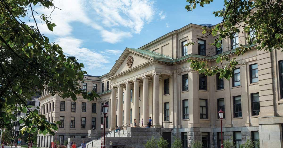 Facade of Tabaret Hall in early spring.