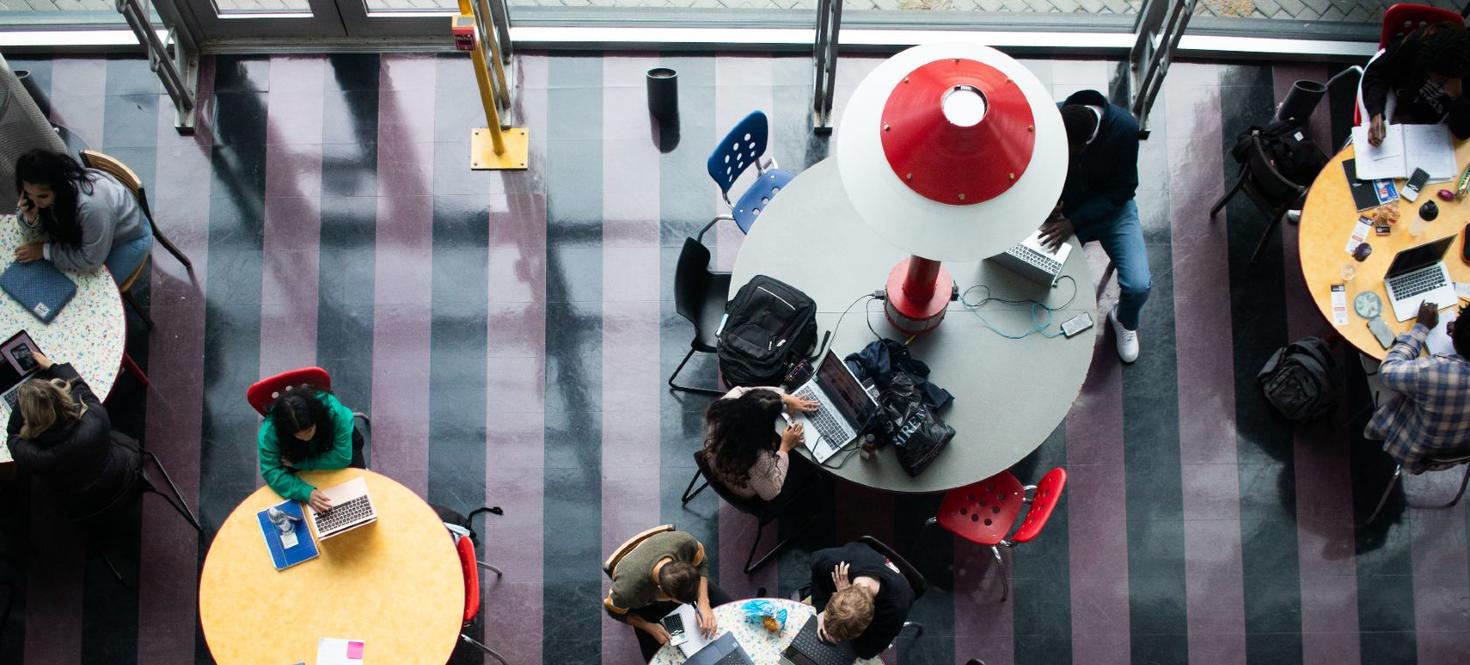 An overhead view of students studying inside SITE