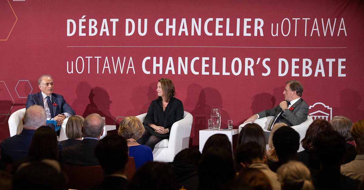 People on stage at the Chancellor's debate.