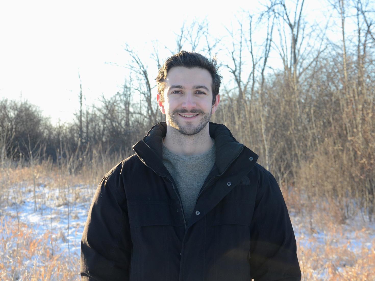 Zachary John Comeau headshot