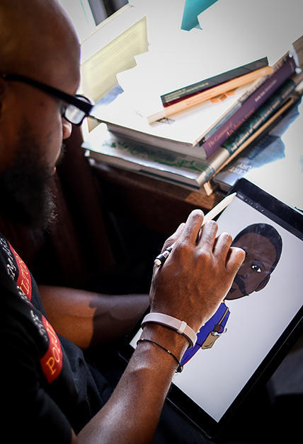 Merryl-Royce Ndema-Moussa illustrating on ipad