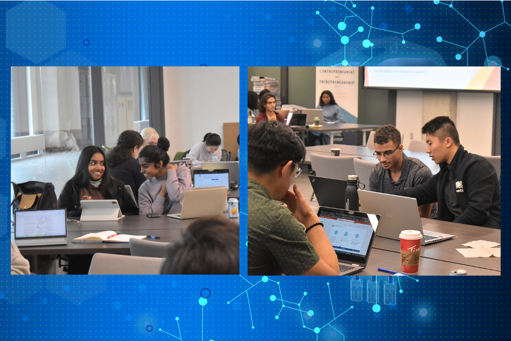 students collaborating using computers in a workshop setting