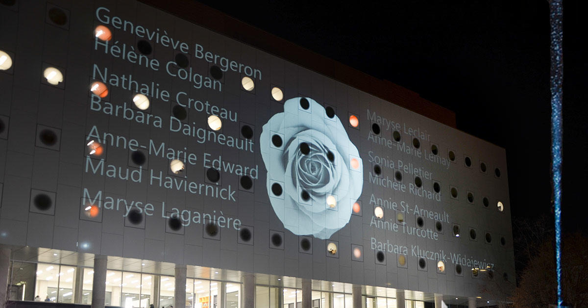 Exterior shot of uOttawa’s STEM Complex with the victims’ names projected on the facade.