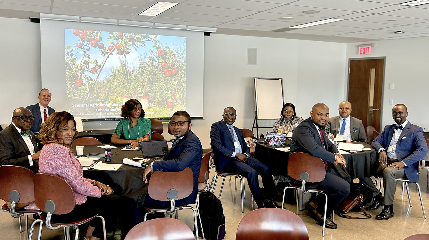 Group of professors in meeting about new Canadian and International Affairs Program