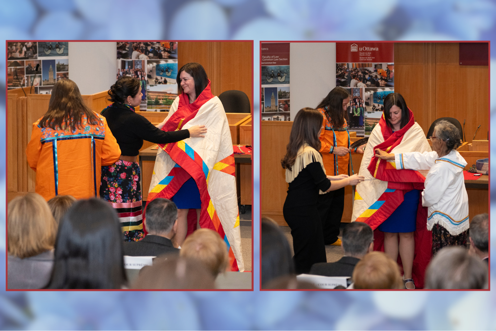 A woman is wrapped in a colourful quilt by three other women
