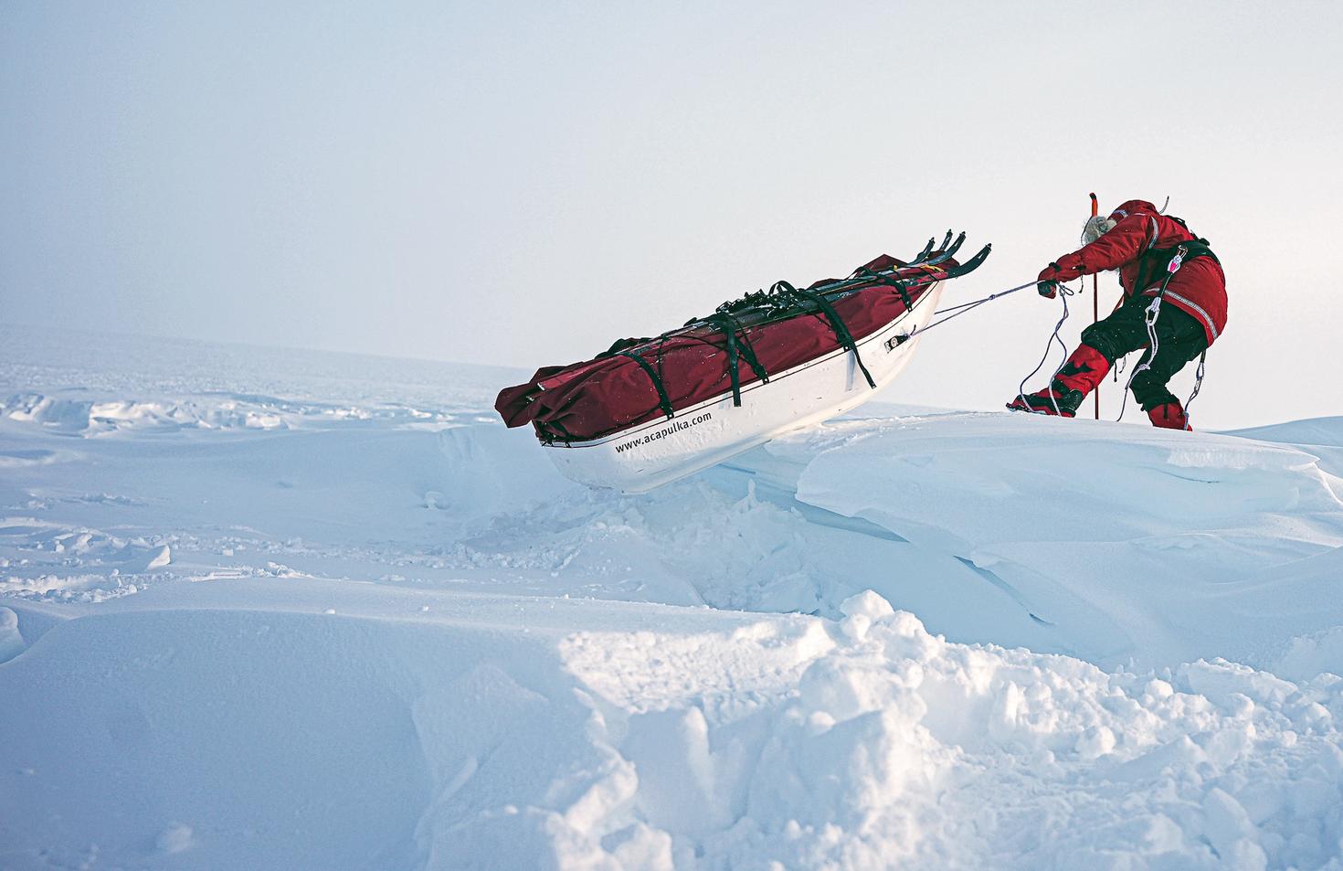  Pascale Marceau pulling an equipment sled over snow