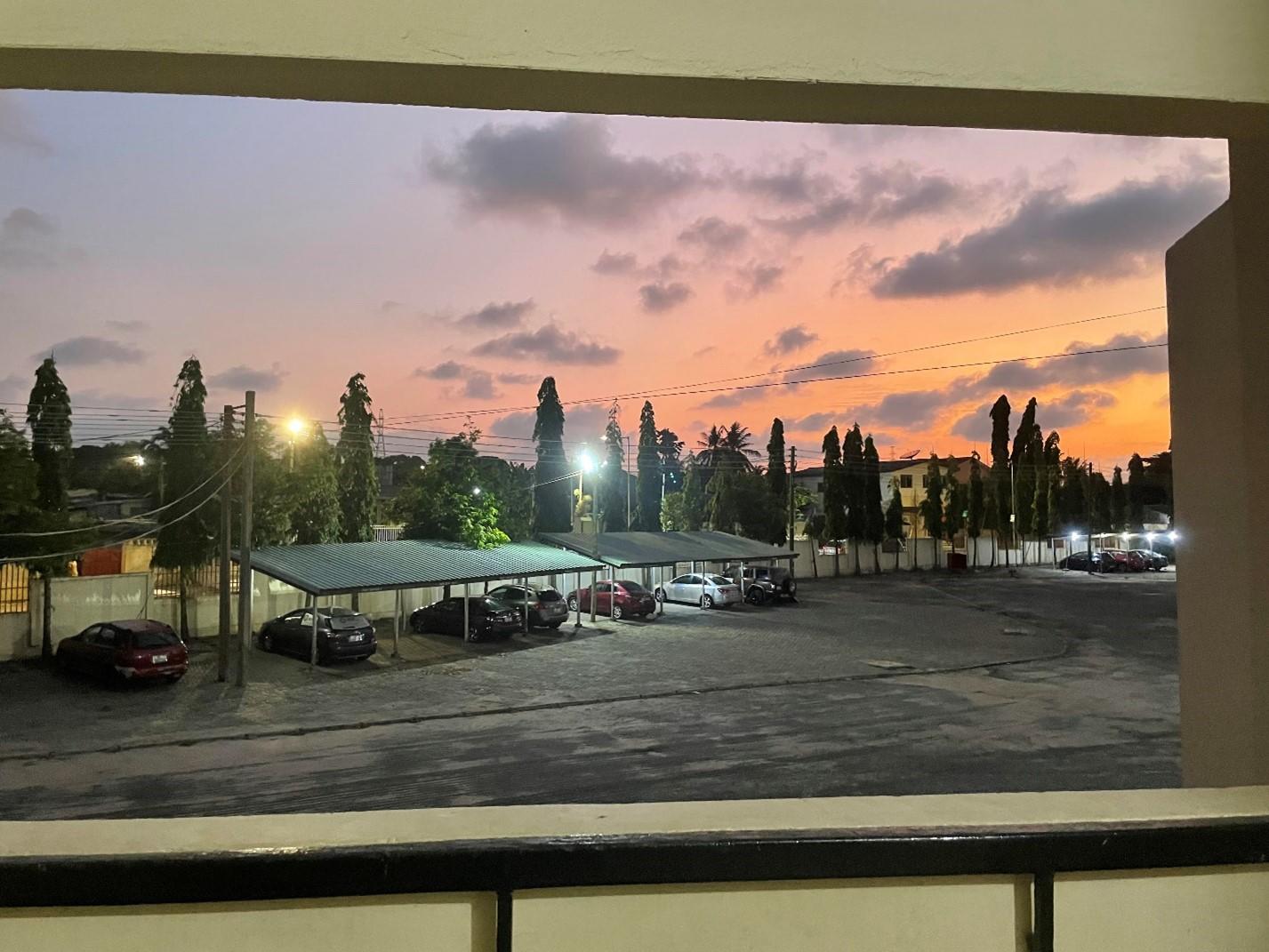 Parking lot view at night from a window