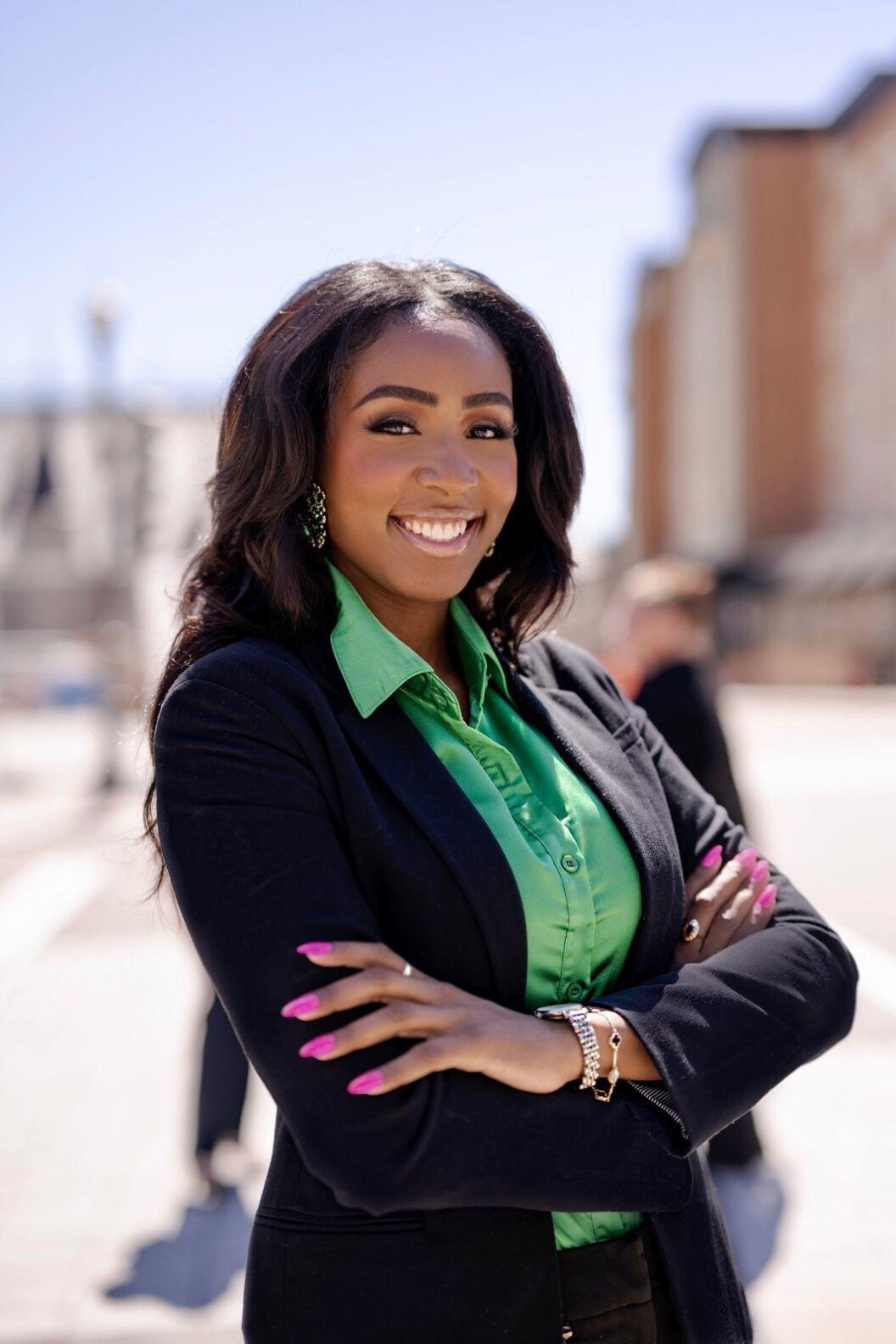 Cici Moya smiling arms crossed