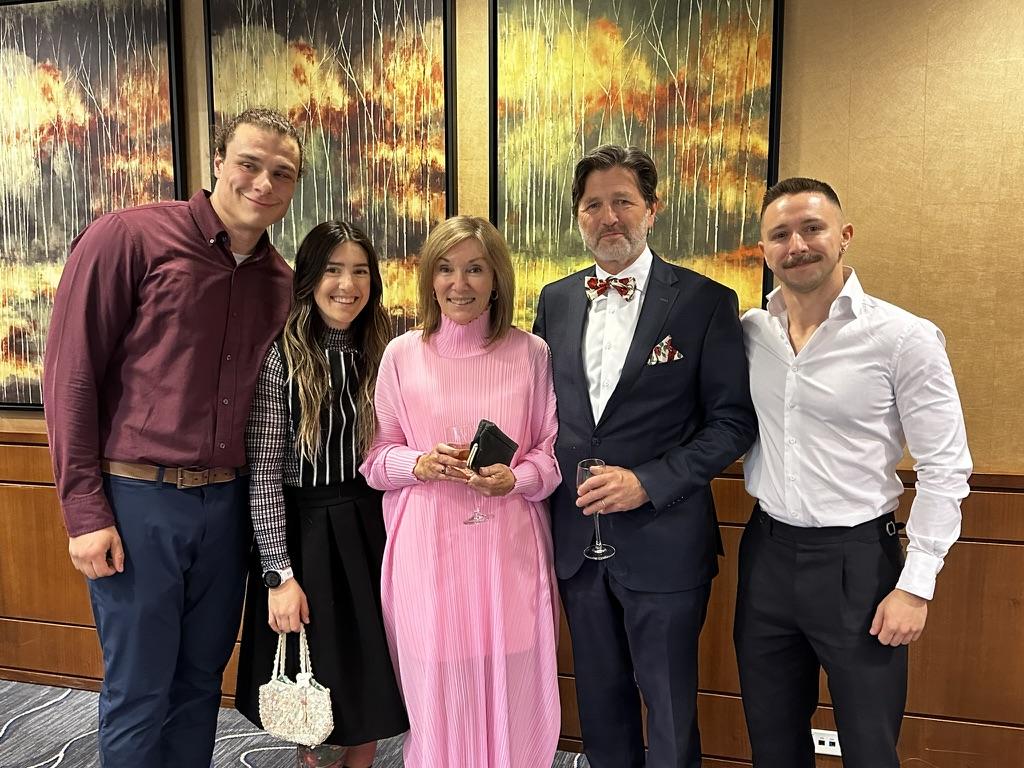 Dr. Dennie receives the CAR Gold Medal, with her family