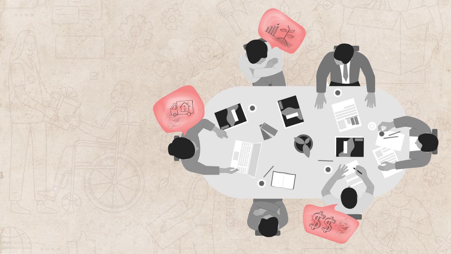 Top view of team brainstorming around a meeting table.