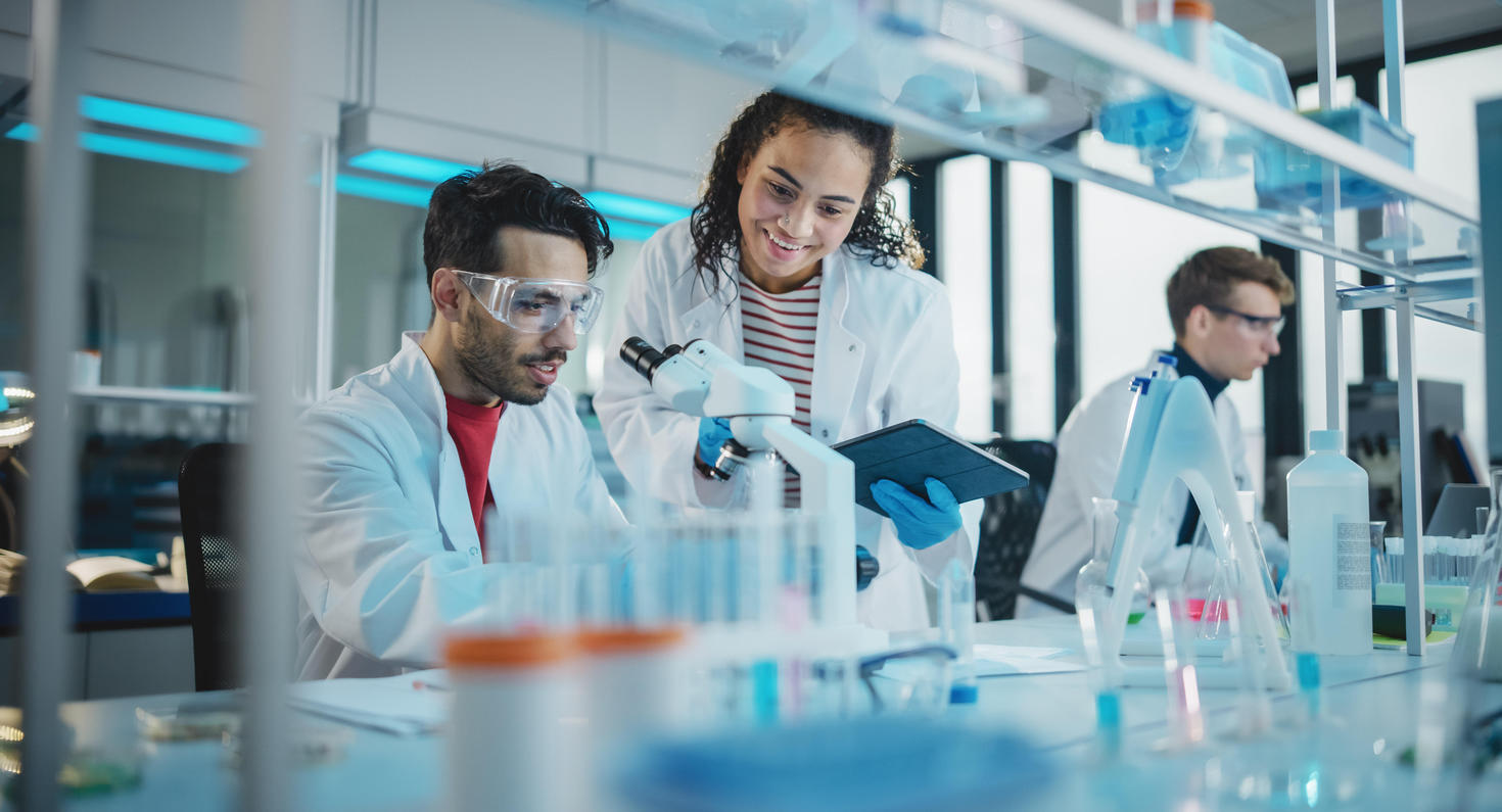 scientists performing research in a laboratory