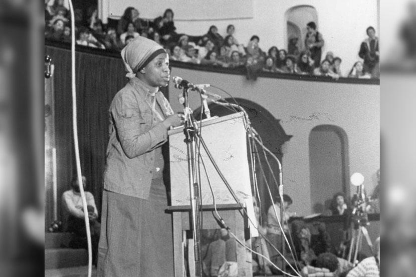 Sherona Hall giving a speech at International Women’s Day Rally, Convocation Hall, University of Toronto (11 March 1978), Archives and Special Collections, University of Ottawa, 10-001-S3-I226