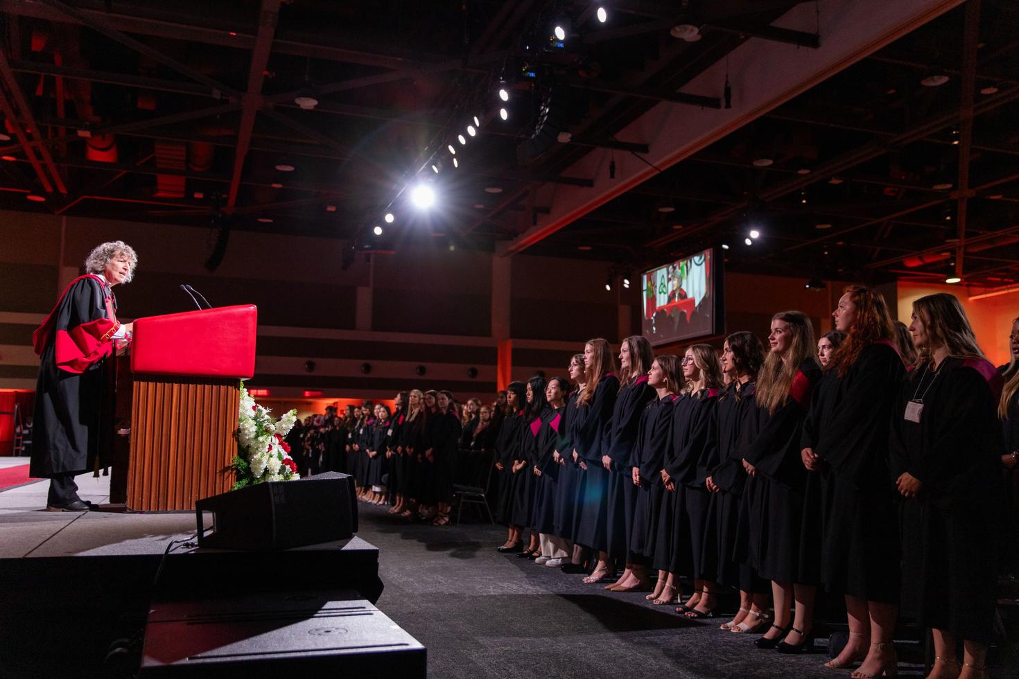 Dean Lucie Thibault talking to graduates at convocation