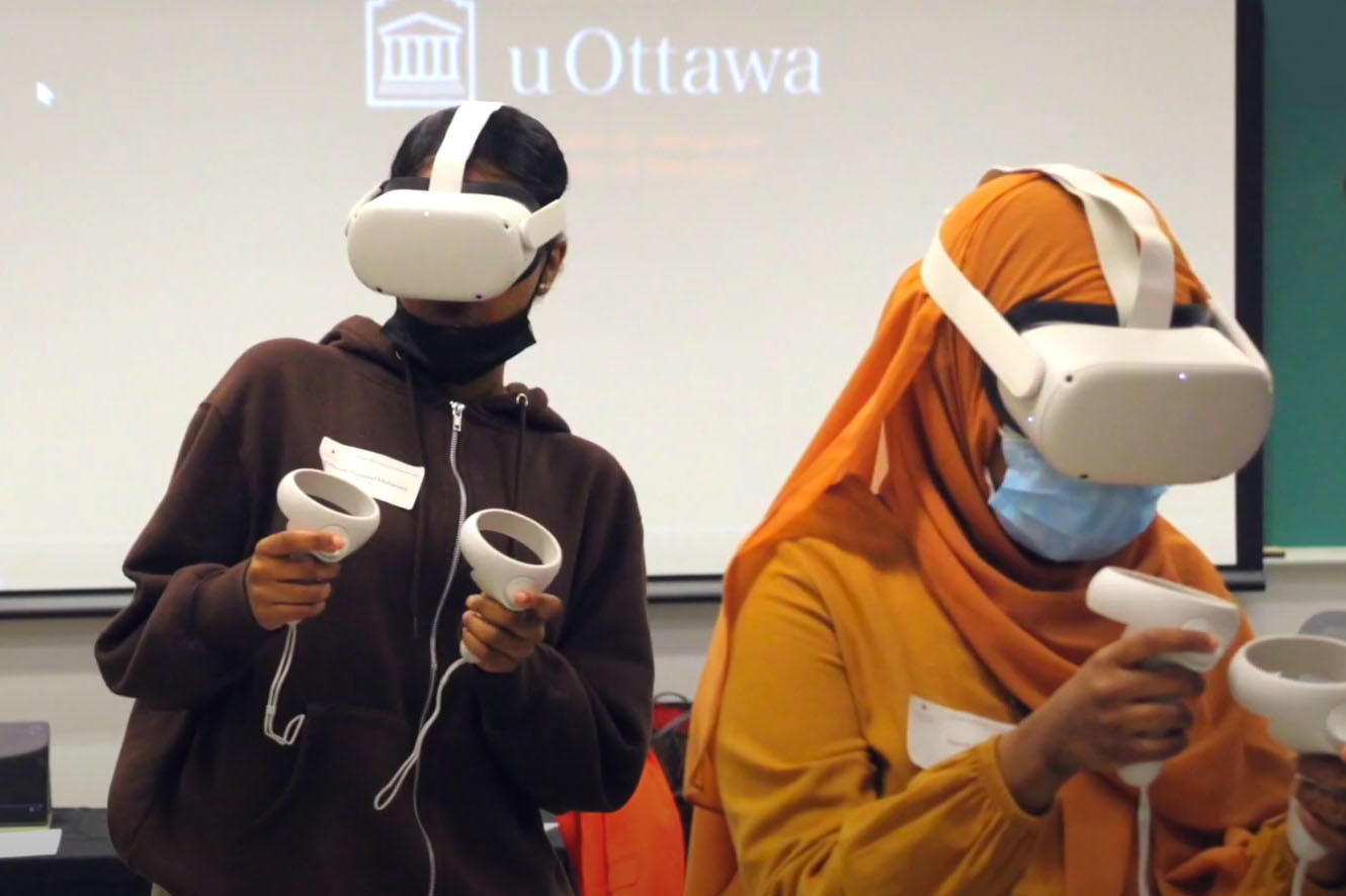 Two medical students participating in a virtual reality activity.