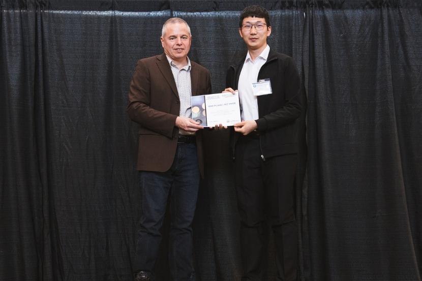 From left to right: Interim Dean Michel Labrosse and Yiran Guan