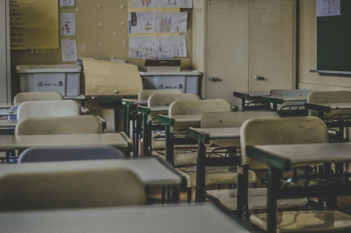 Student desks in an empty classroom