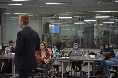 Students listening to a presentation