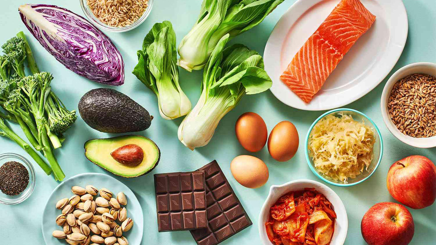 Healthy food including salmon, eggs, avocados and nuts.
