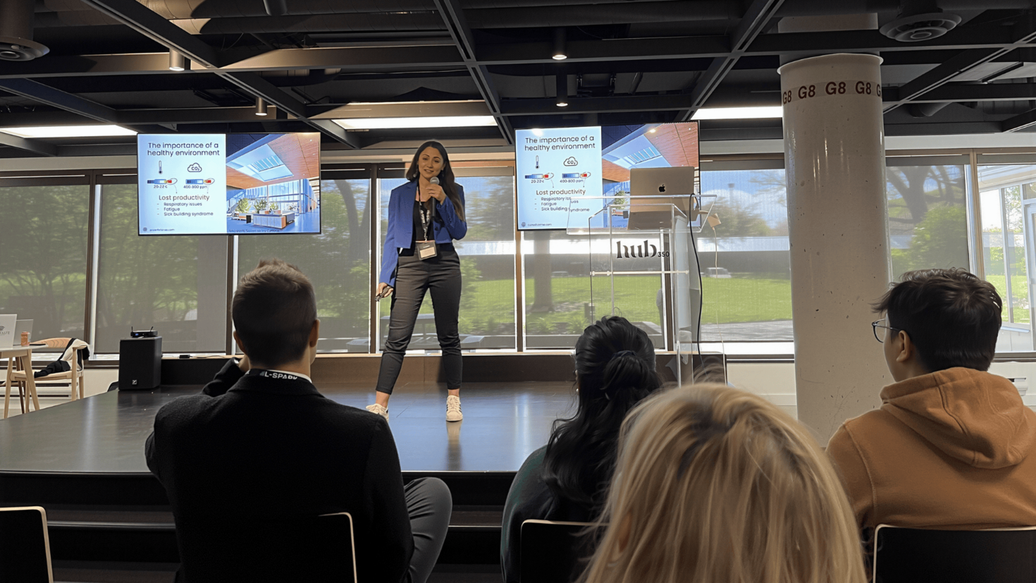 Olga Koppel presenting to an audience at Hub350