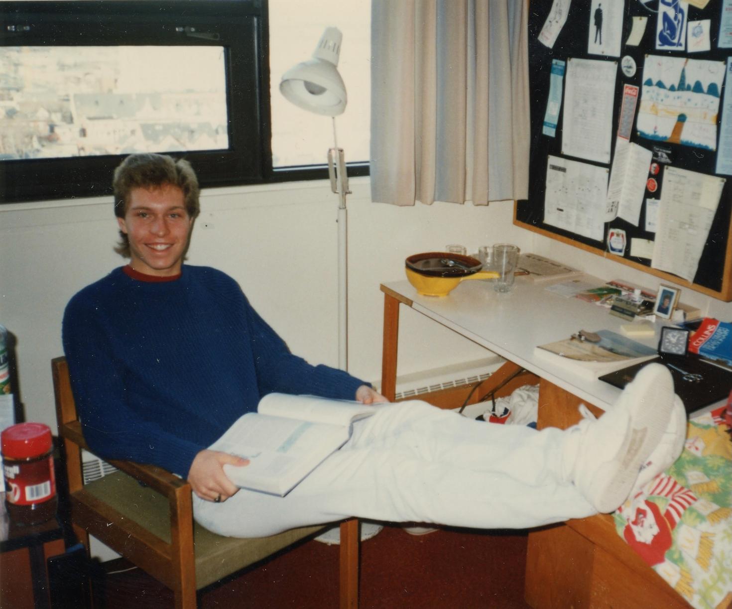 Reg, circa 1988, studying in his dorm room in Thompson Residence. 