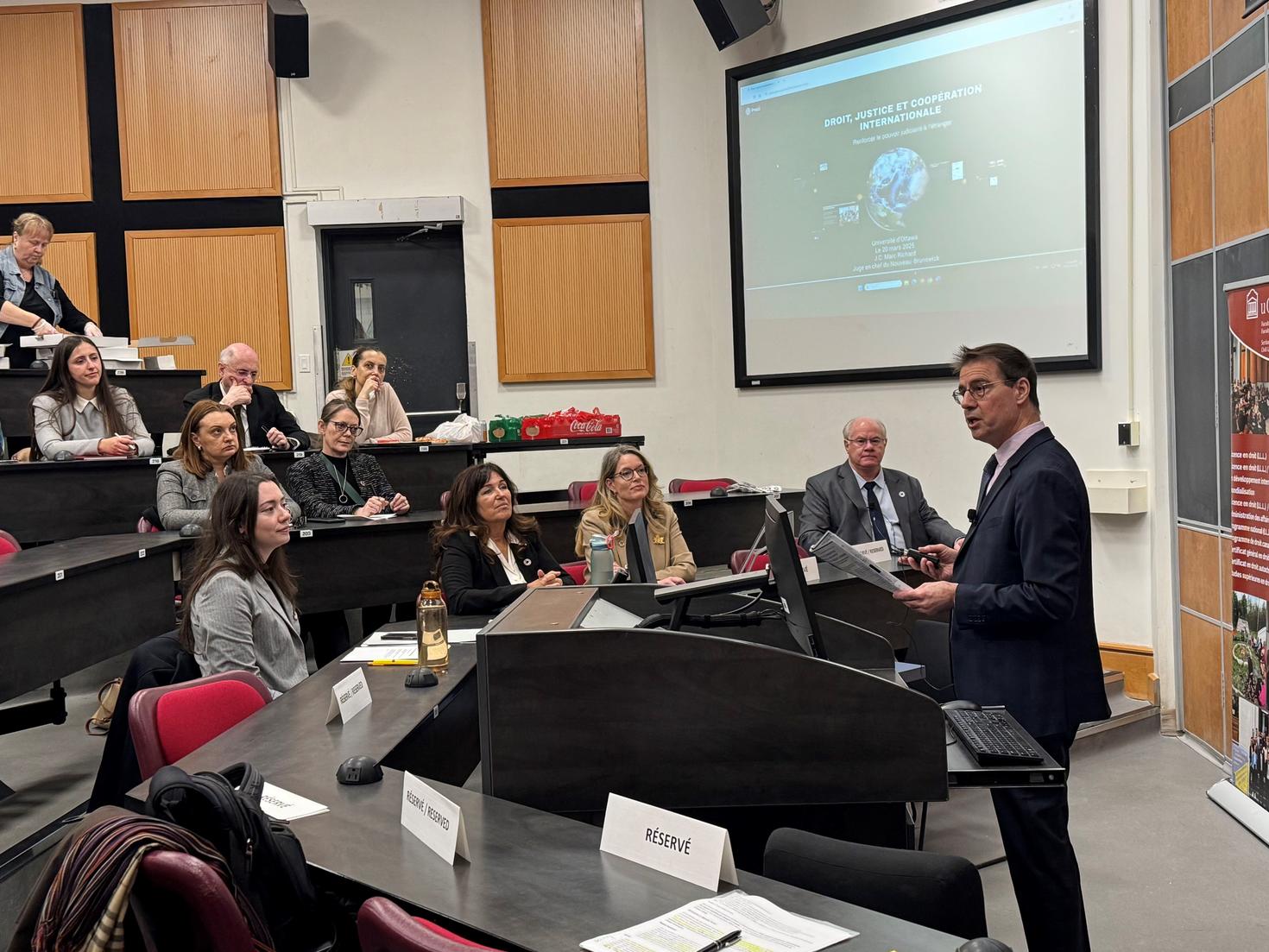 Stephen Baranyi speaking to panelists and students in attendance