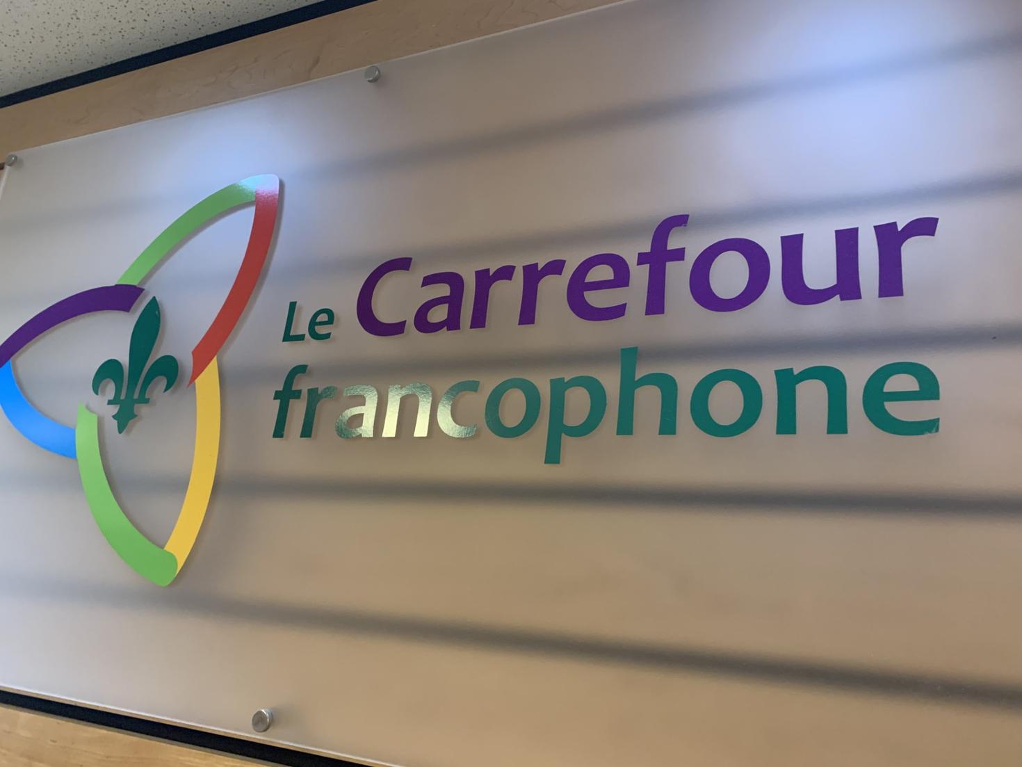 The Carrefour francophone sign.