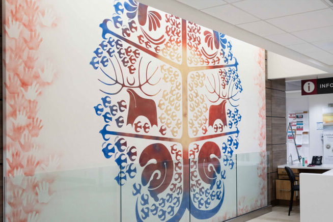 Colourful artwork depicting animals in a tree formation