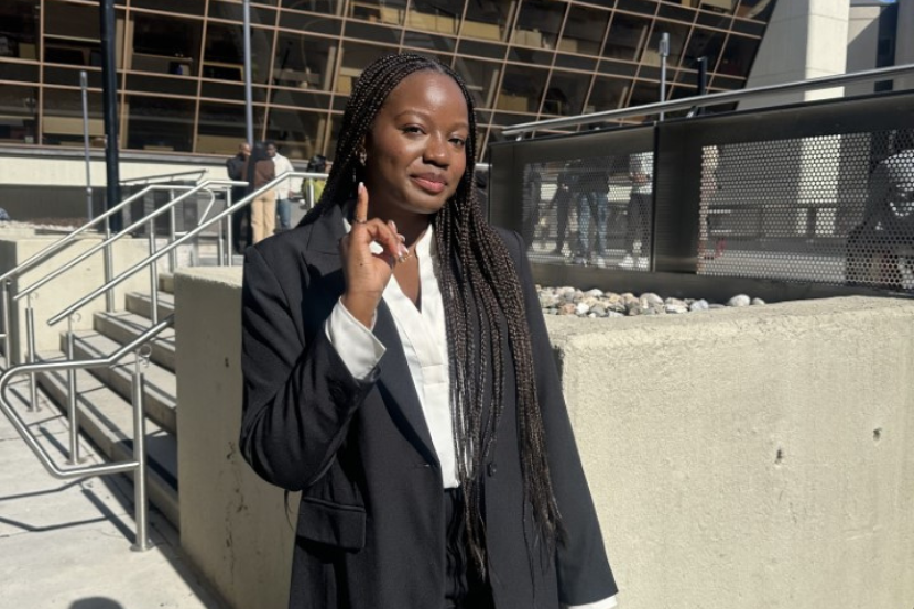 Moyin Wright in front of the Montpetit Building.