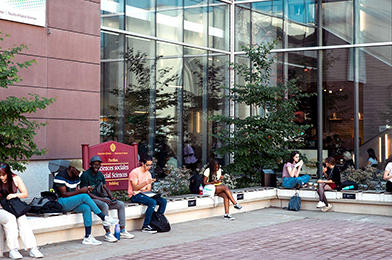 Students in front of the Indigenous garden at uOttawa’s Social Sciences Building.