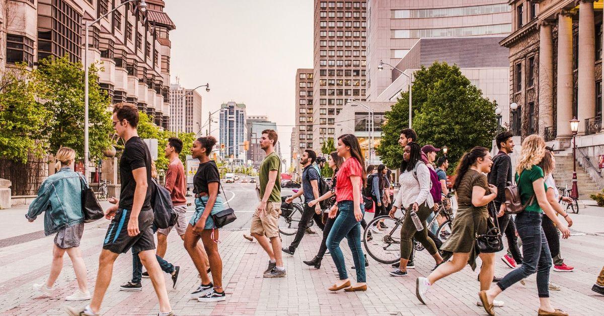 Students walking through a crosswalk