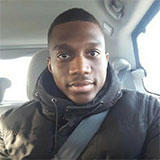 Selfie of davidnku sitting in the driver's seat of a car