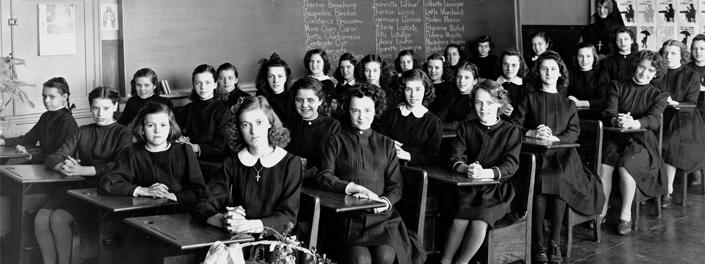 Young girls in a classroom. 